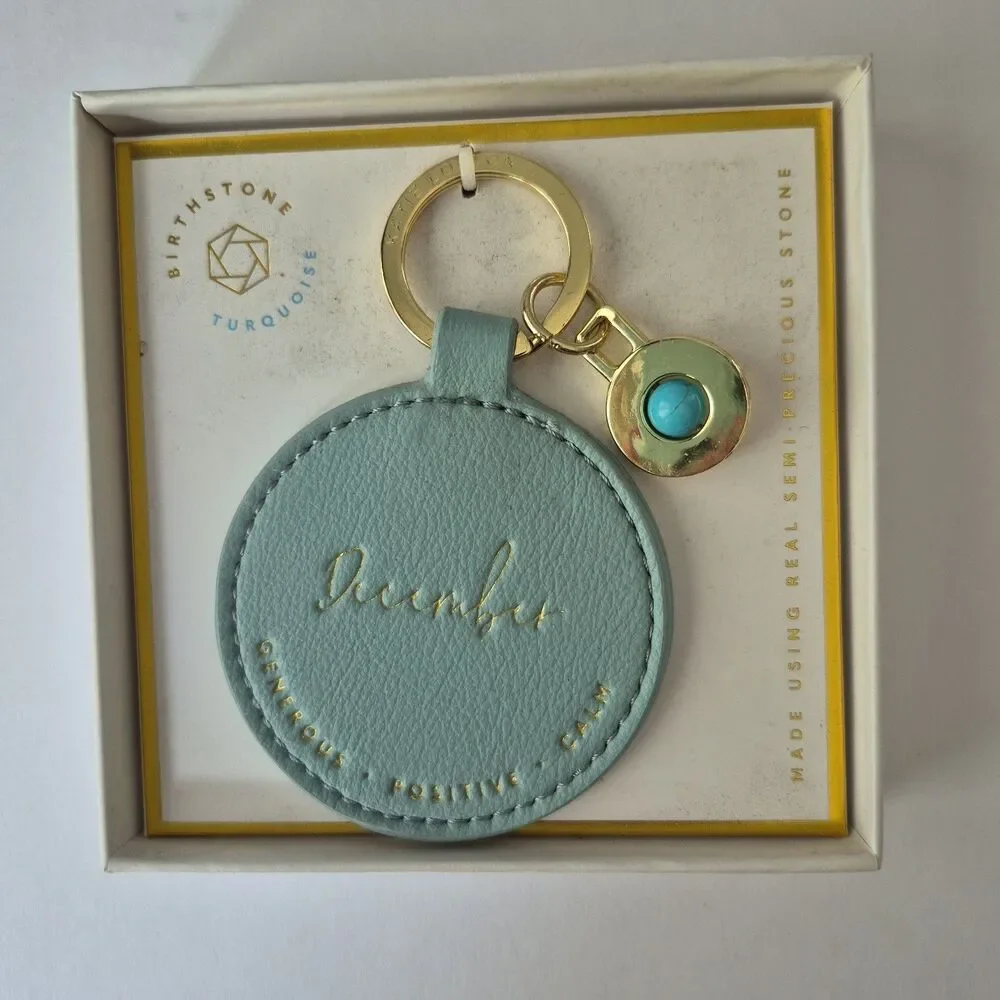 Katie Loxton December Birthstone Generous Positive Calm Round Leather Keychain